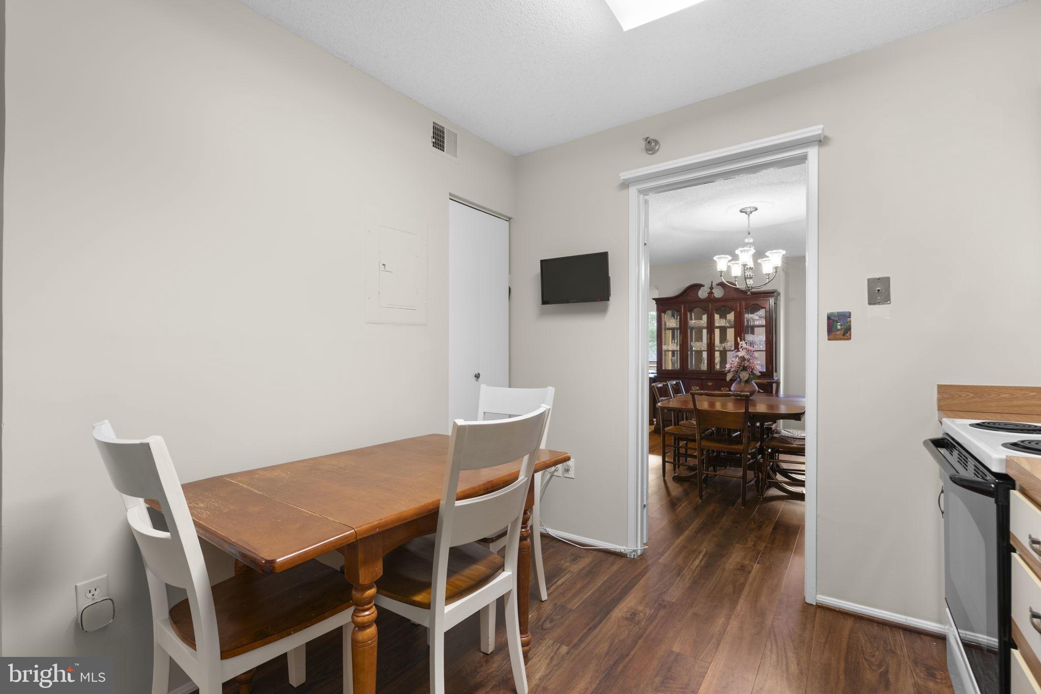 15115 Interlachen Drive, Unit 3204 Silver Spring, MD 20906 - Photo 16 of 50 Cozy dining nook with inviting flow.
