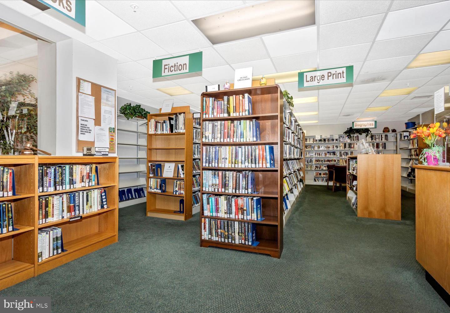 15115 Interlachen Drive, Unit 3204 Silver Spring, MD 20906 - Photo 35 of 50 Welcoming space for book lovers.