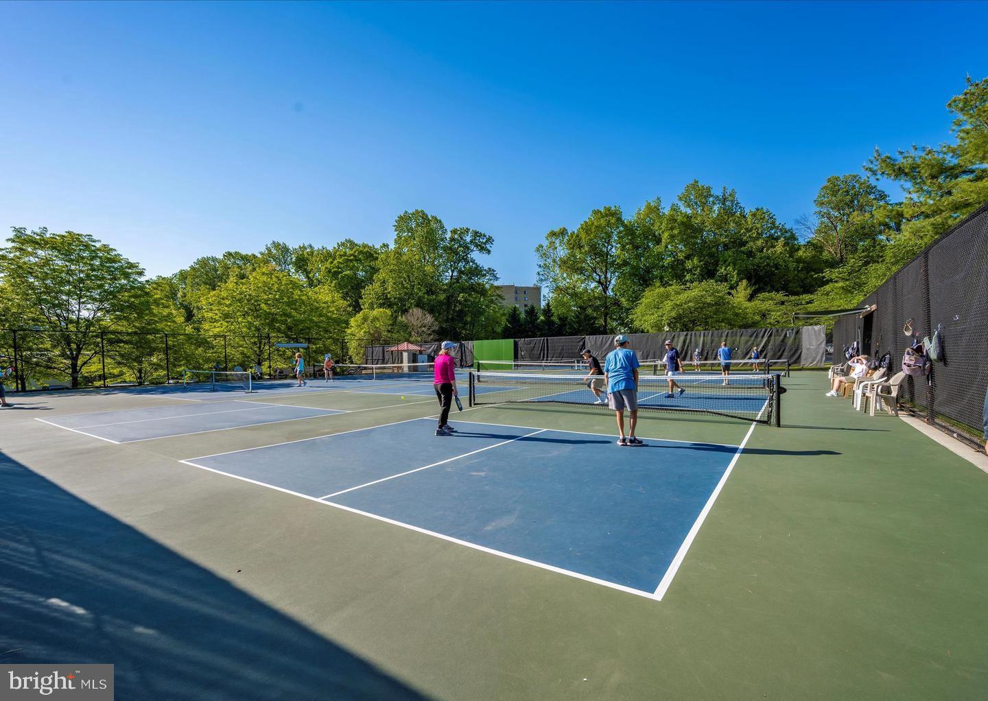15115 Interlachen Drive, Unit 3204 Silver Spring, MD 20906 - Photo 43 of 50 Sunny day at the tennis courts.