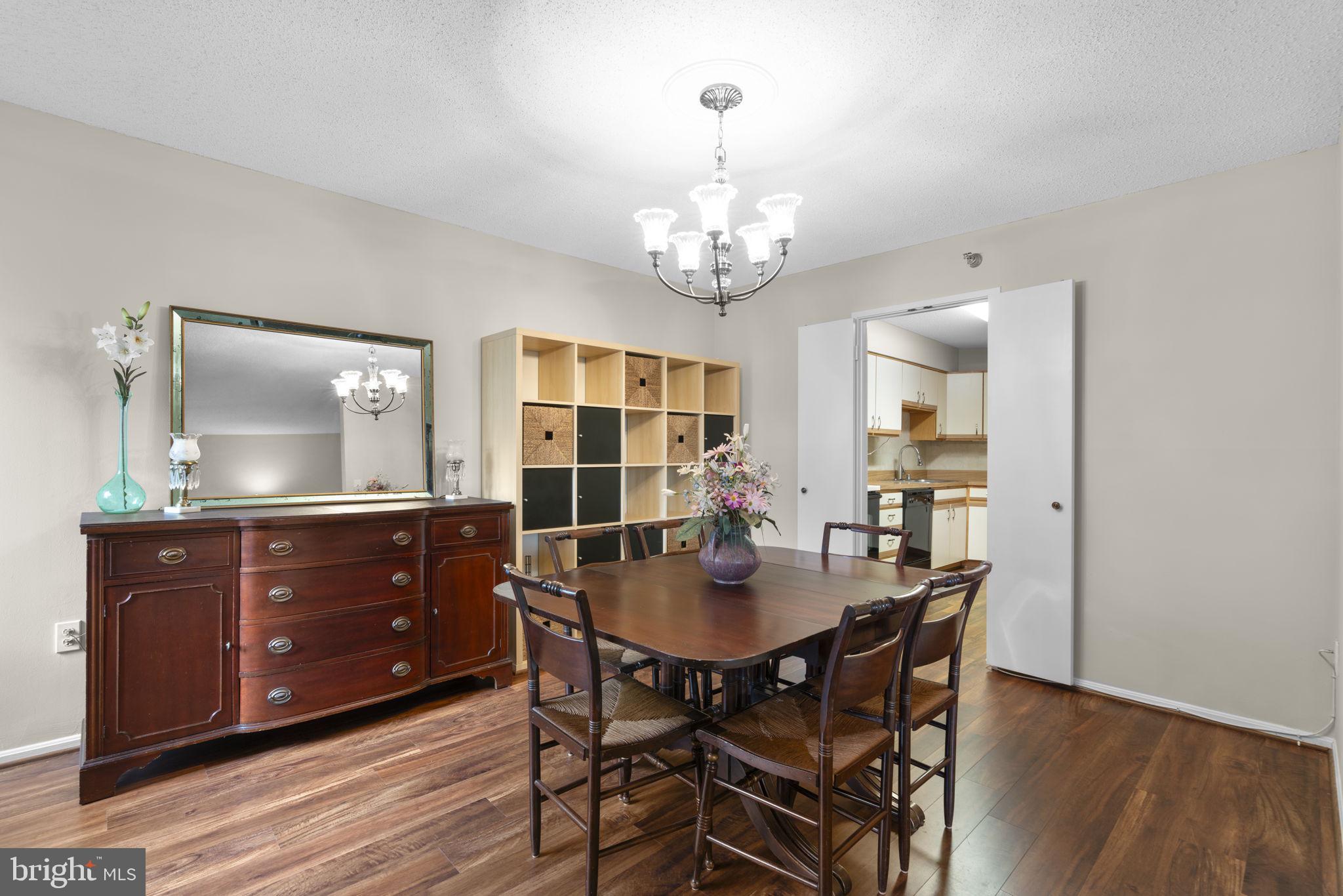 15115 Interlachen Drive, Unit 3204 Silver Spring, MD 20906 - Photo 9 of 50 Charming dining space with warm tones.