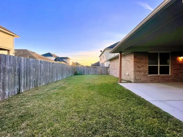 a view of a backyard with a garden