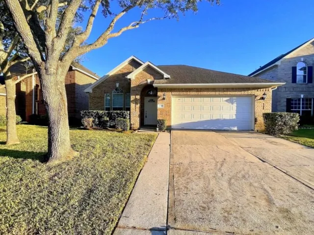 a view of a house with a snow in the yard