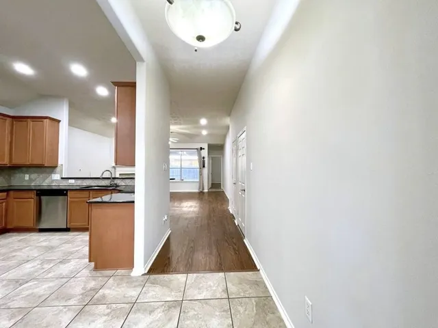 a long hallway with a large window