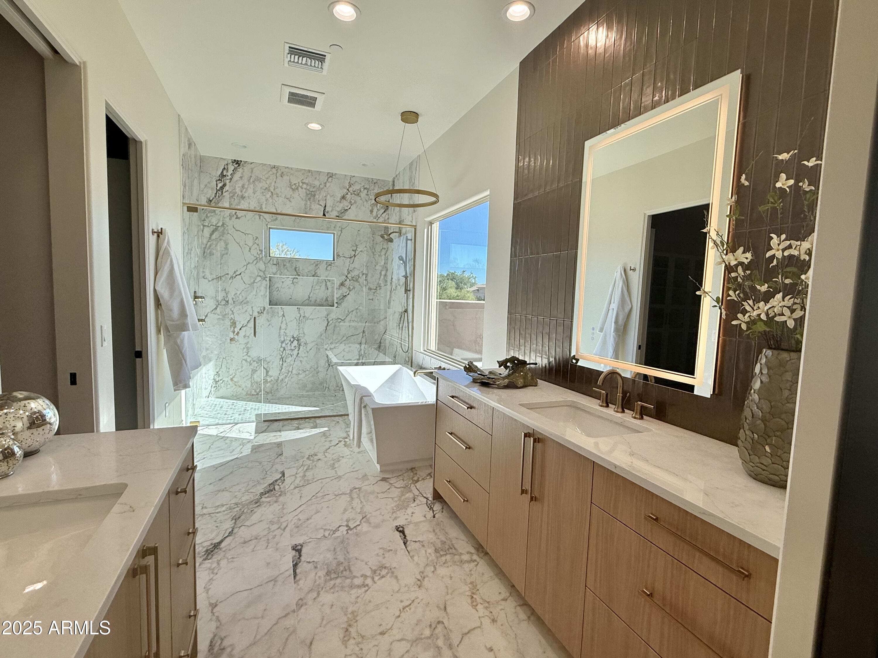 27227 North Miller Road Scottsdale, AZ 85266 - Photo 14 of 31 a bathroom with a double vanity sink mirror double and bathtub
