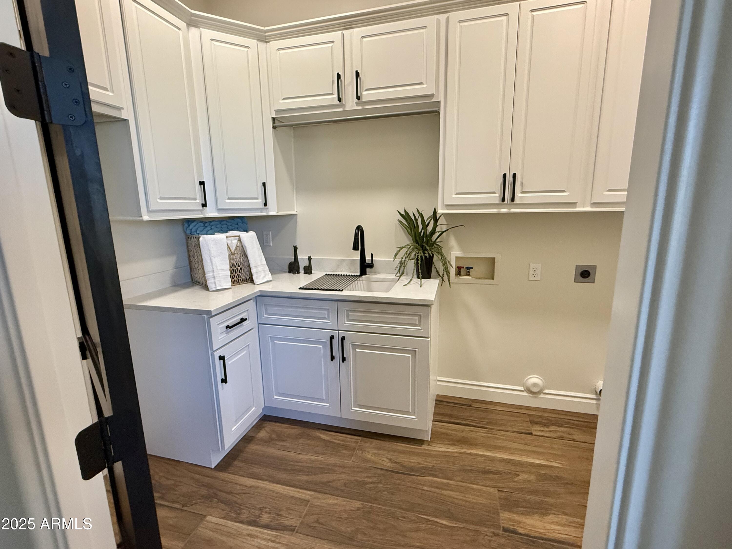 27227 North Miller Road Scottsdale, AZ 85266 - Photo 15 of 31 a kitchen with white cabinets and sink