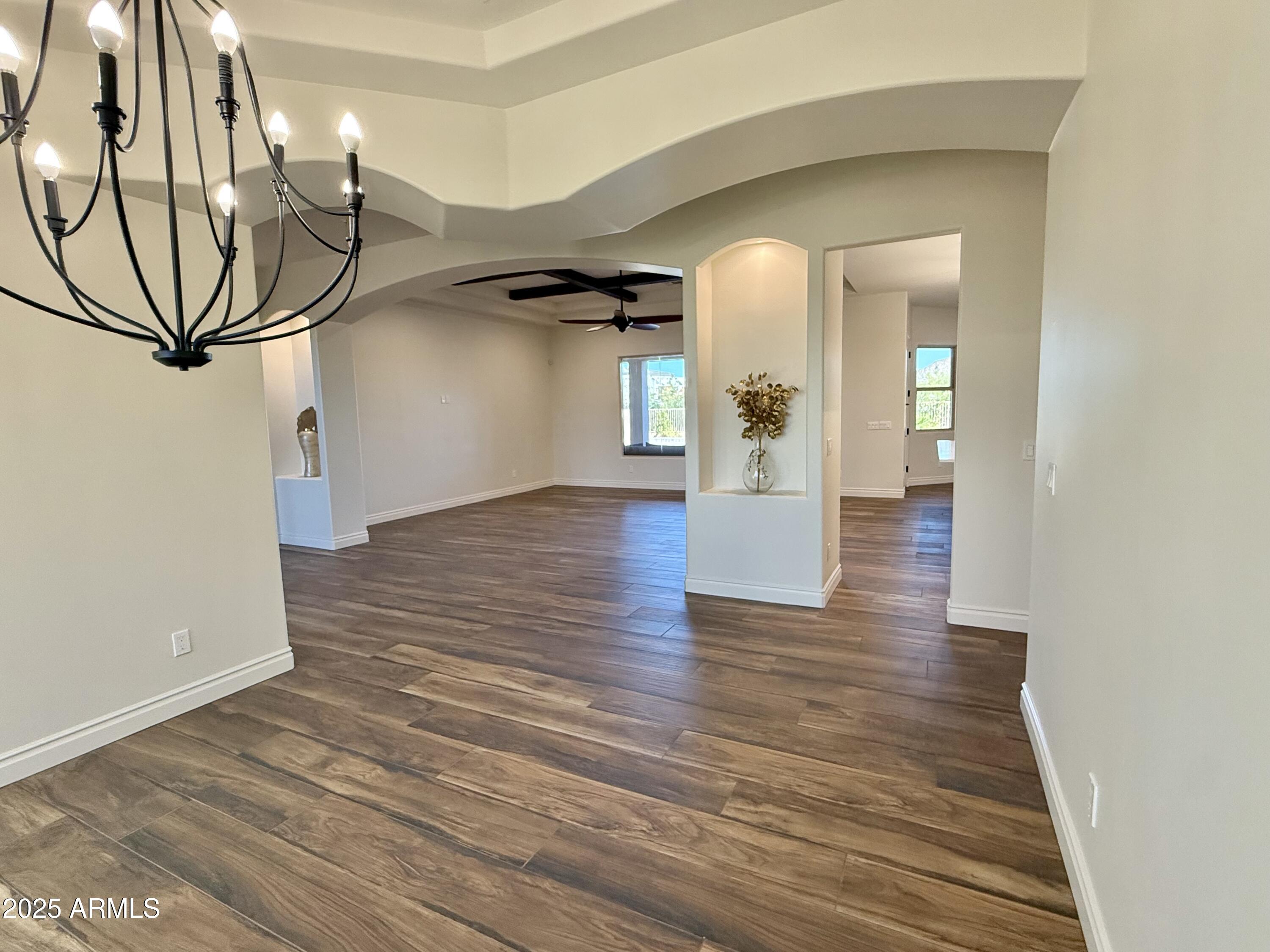 27227 North Miller Road Scottsdale, AZ 85266 - Photo 5 of 31 a view of a hallway with wooden floor