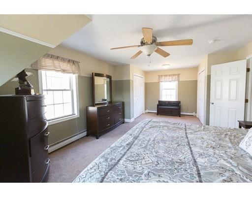 192 Damon Road Ashby, MA 01431 - Photo 12 of 21 a living room with furniture windows and a flat screen tv