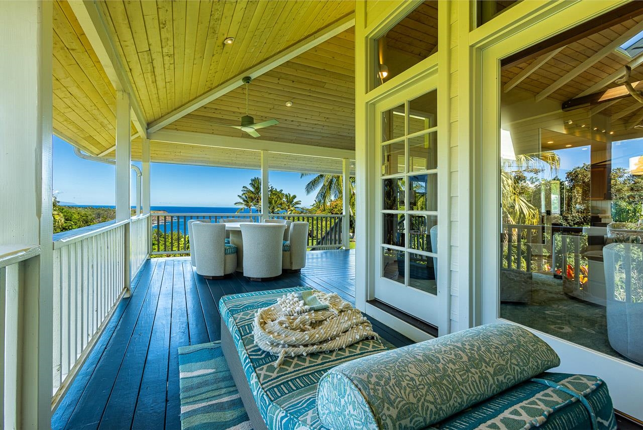 555 North Holokai Road Haiku, HI 96708 - Photo 16 of 50 The ocean-side covered wrap-around lanai is a highlight of this unique property
