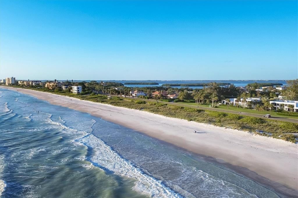 825 Bayport Way, Unit 825 Longboat Key, FL 34228 - Photo 11 of 62 a view of an ocean beach and city