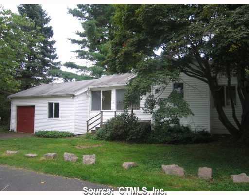 15 Three Elms Road Branford, CT 06405 - Photo 1 of 1 a front view of house with yard and green space
