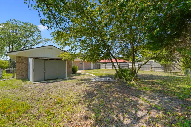 a house with trees in front of it