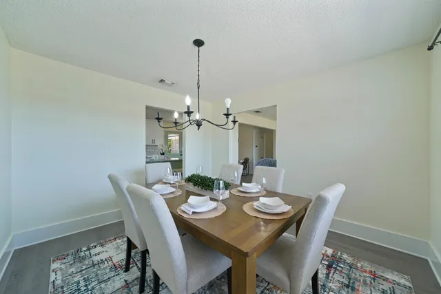 a view of a dining room with furniture