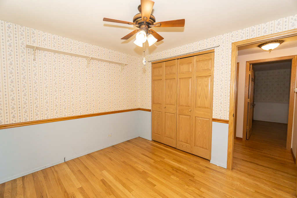 1908 Capri Lane Schaumburg, IL 60193 - Photo 24 of 39 a view of empty room with wooden floor