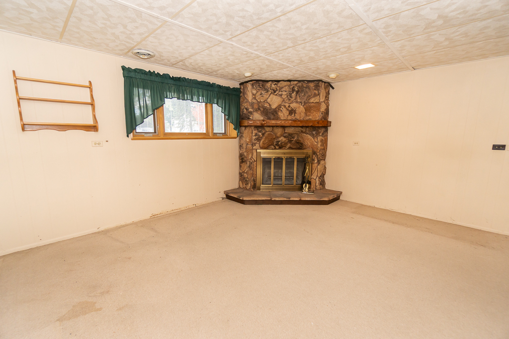 1908 Capri Lane Schaumburg, IL 60193 - Photo 26 of 39 an empty room with wooden floor and windows