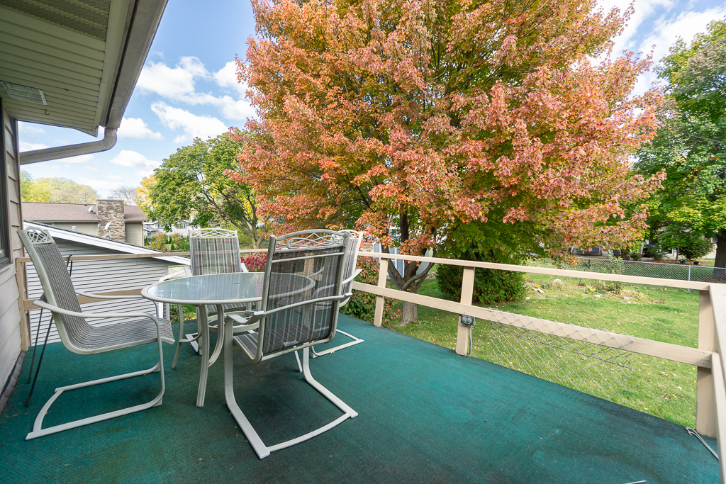 1908 Capri Lane Schaumburg, IL 60193 - Photo 35 of 39 a view of a chairs and table in the backyard