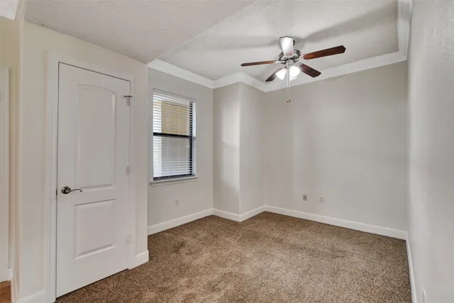 a view of livingroom with hardwood floor and ceiling fan