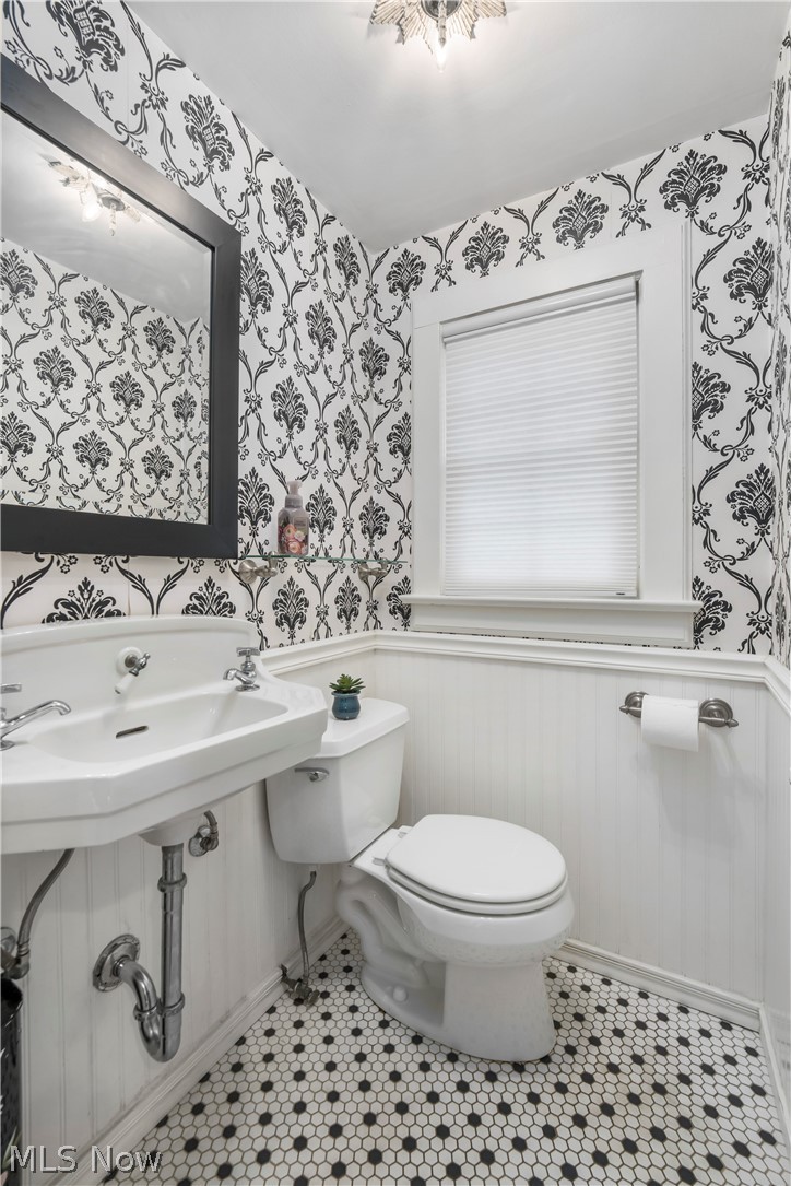 2960 Midvale Road Northwest Canton, OH 44718 - Photo 15 of 42 Bathroom with sink, toilet, and tile floors
