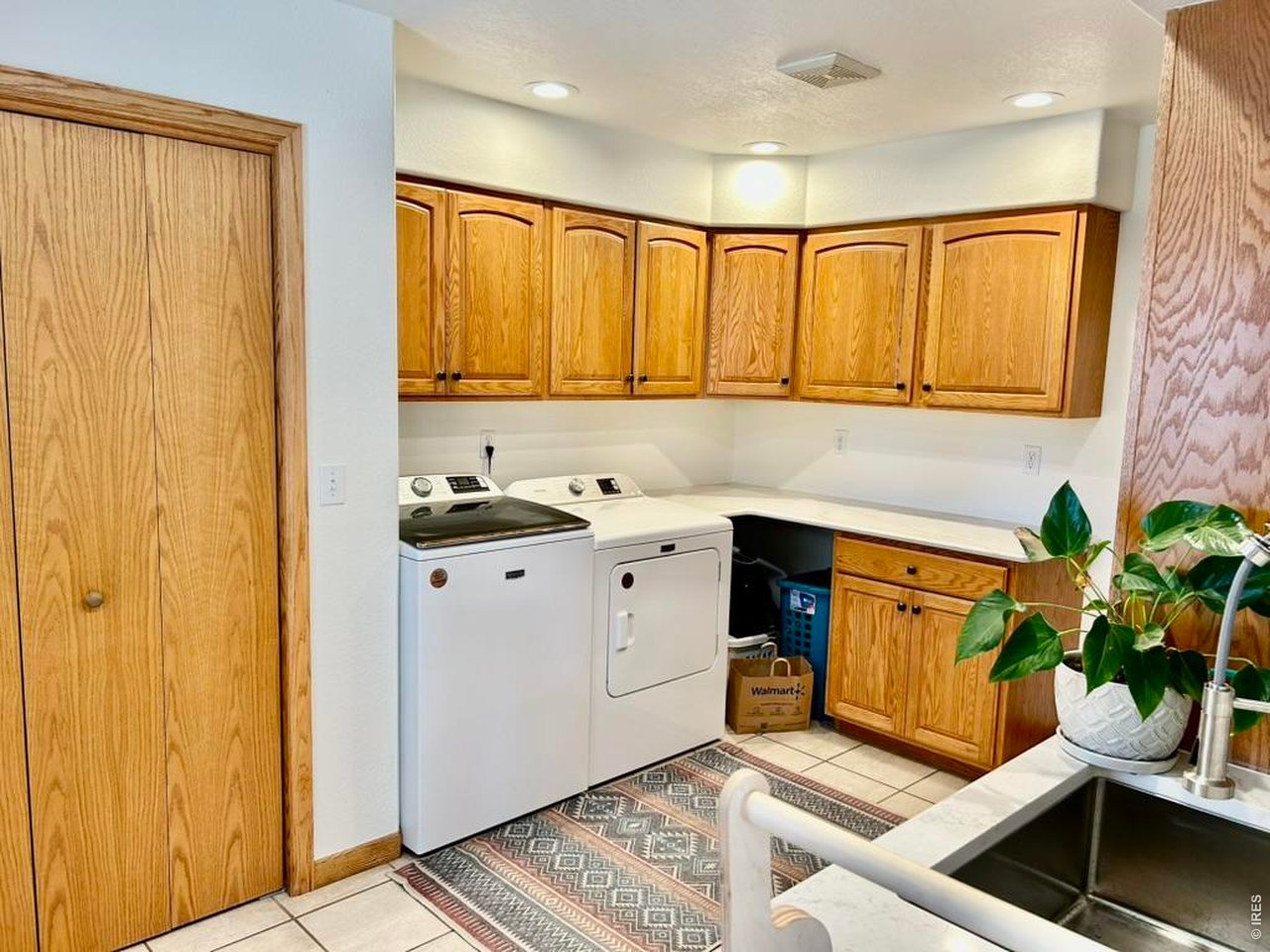 14348 Dakota Road Sterling, CO 80751 - Photo 21 of 50 Nice Size Main Floor Laundry Room With Lots of Storage