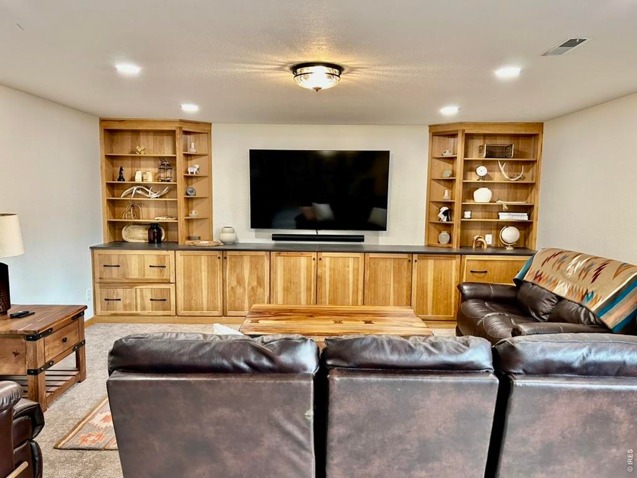 14348 Dakota Road Sterling, CO 80751 - Photo 33 of 50 Cozy Gathering Area In Basement Family Room