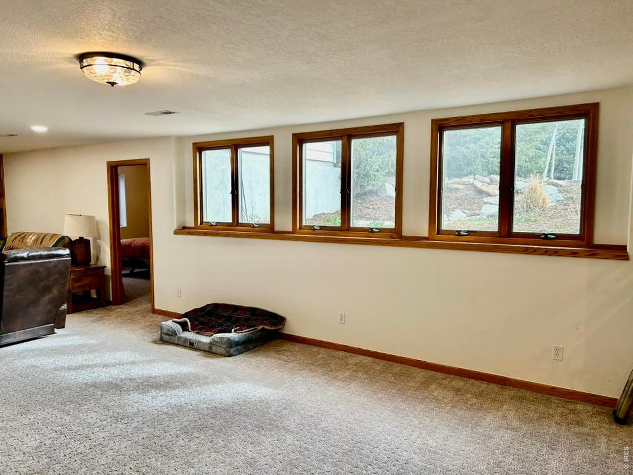 14348 Dakota Road Sterling, CO 80751 - Photo 39 of 50 Basement Area With Garden Level View