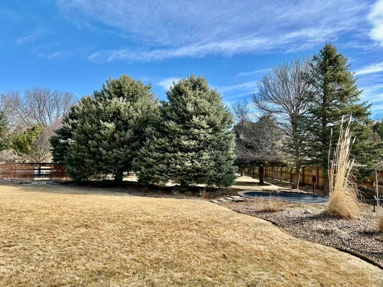 14348 Dakota Road Sterling, CO 80751 - Photo 45 of 50 Back Yard With In-Ground Trampoline