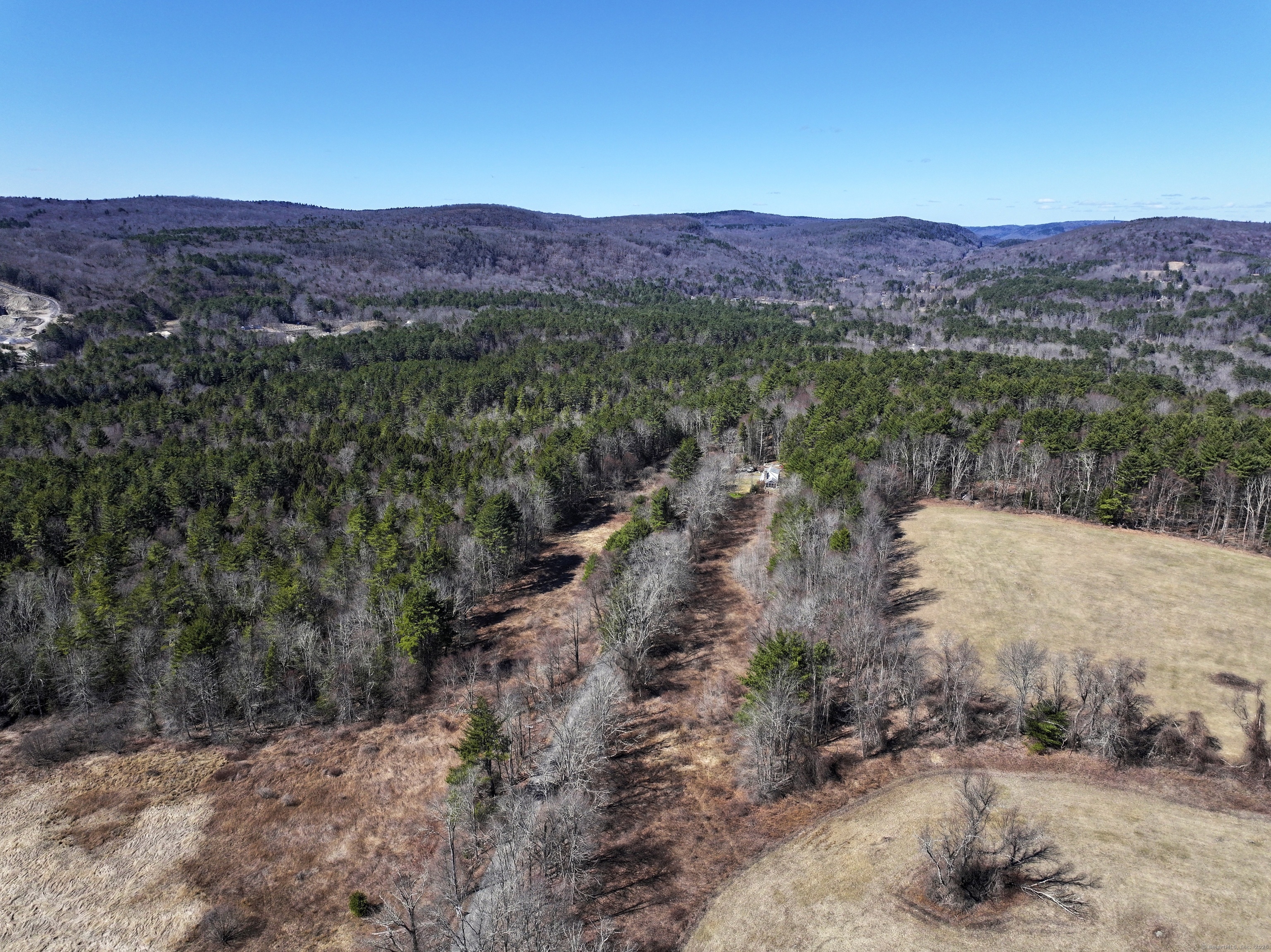 115 Old Robertsville Road Winchester, CT 06098 - Photo 12 of 13 a view of a town with mountains in the background