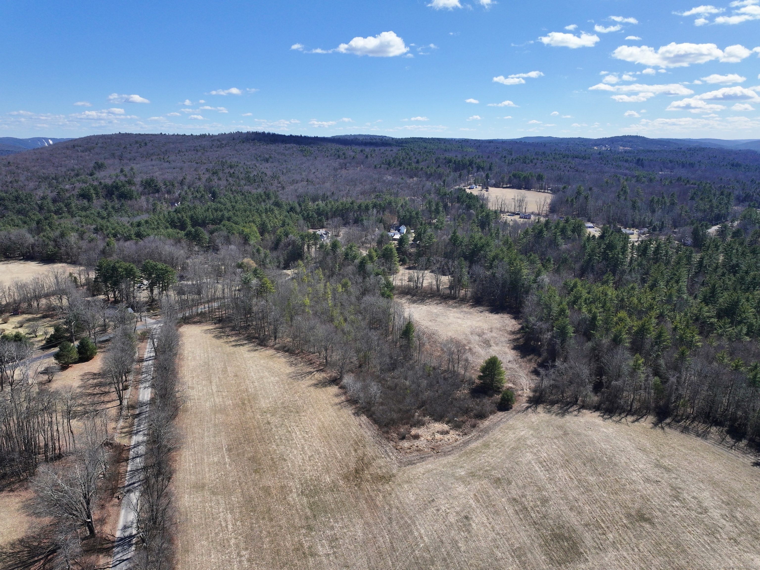 115 Old Robertsville Road Winchester, CT 06098 - Photo 6 of 13 a view of a lake with mountains and mountain view in back