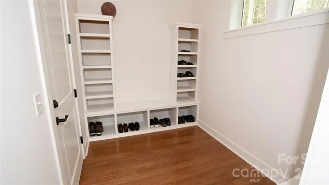 a view of a bedroom with a window