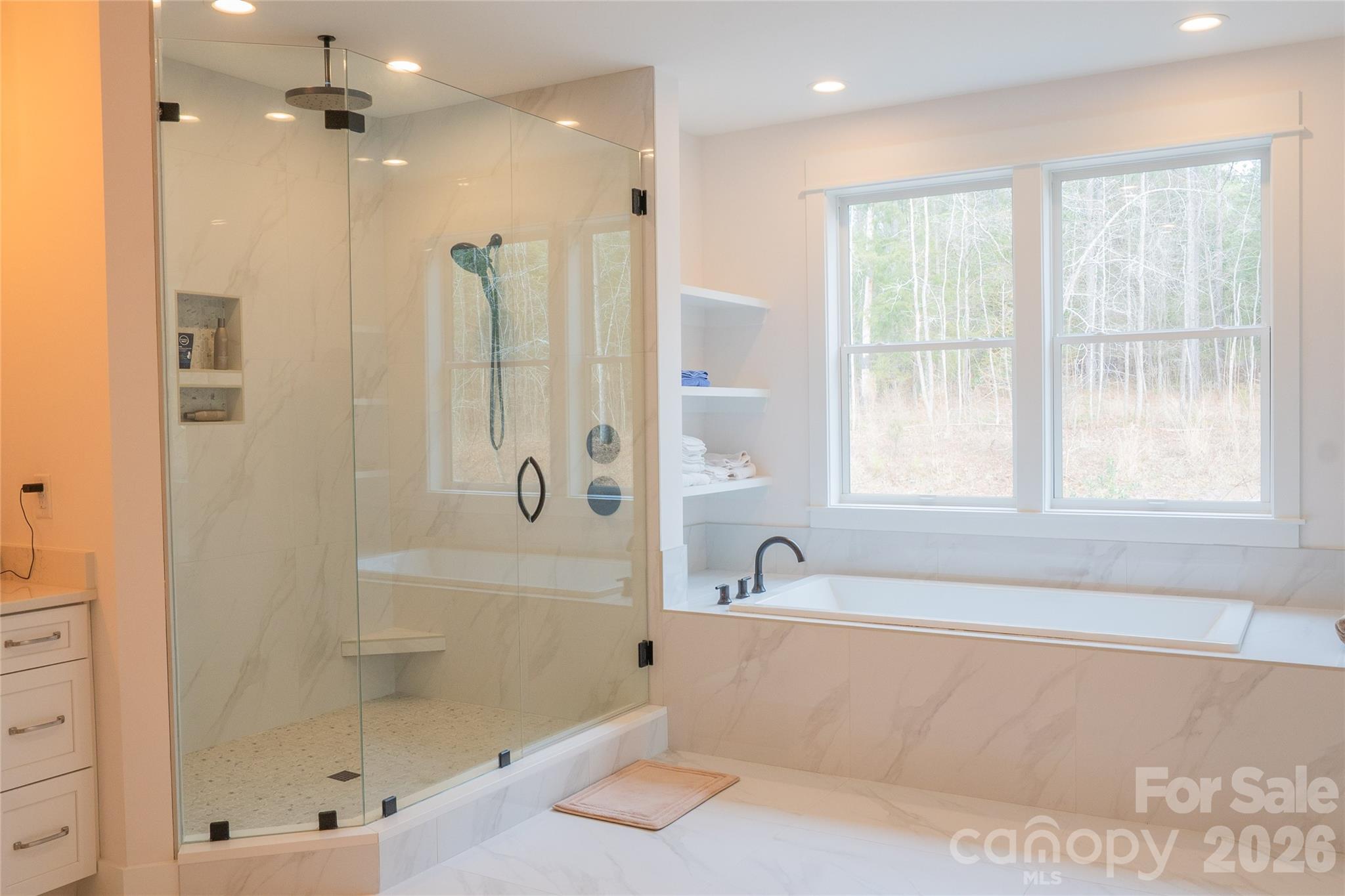 6178 Chimney Bluff Road Lancaster, SC 29720 - Photo 22 of 34 a bathroom with a tub a sink and a shower
