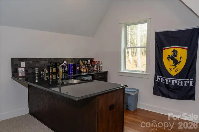 a view of living room with window and furniture
