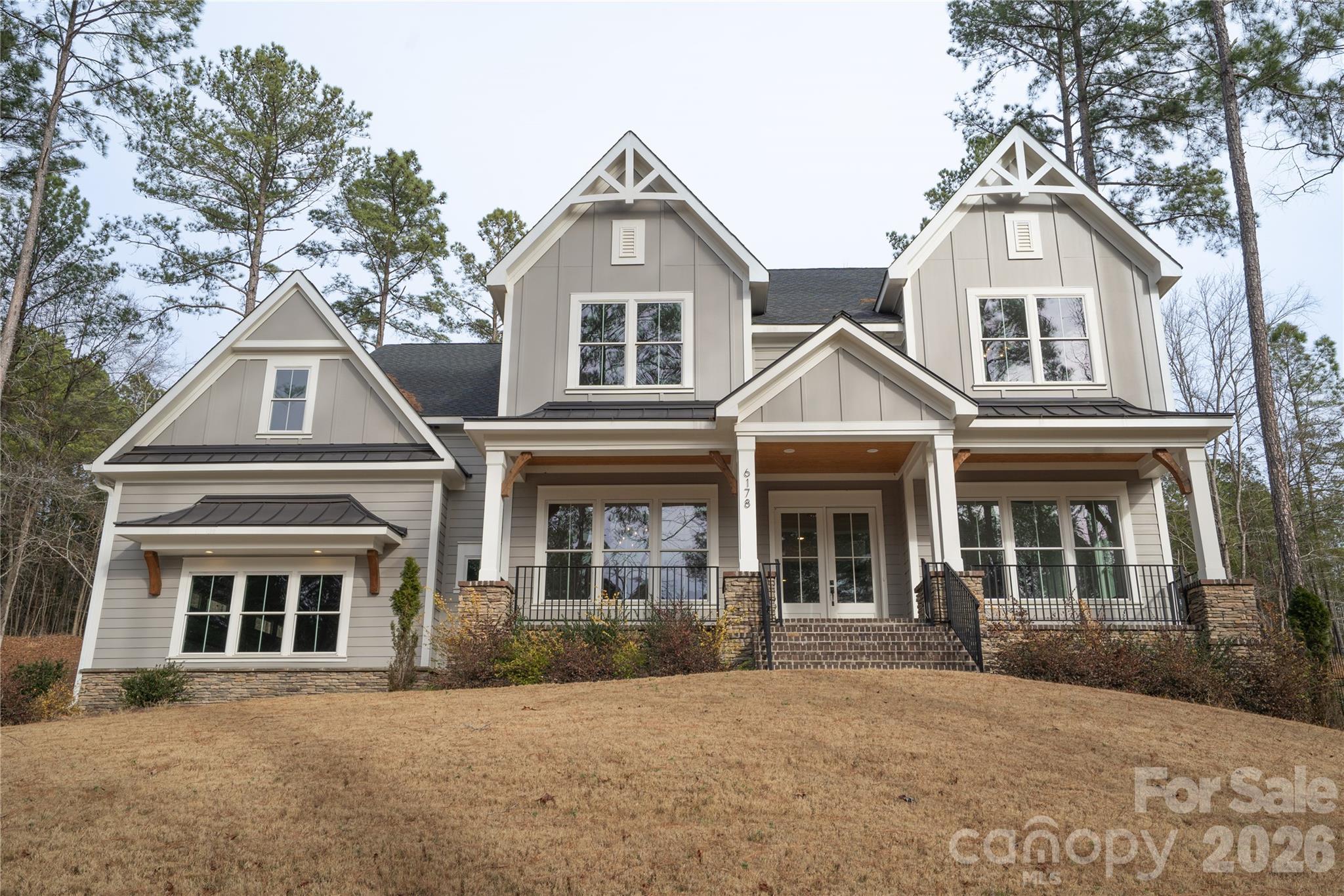 6178 Chimney Bluff Road Lancaster, SC 29720 - Photo 28 of 34 front view of a house with a yard