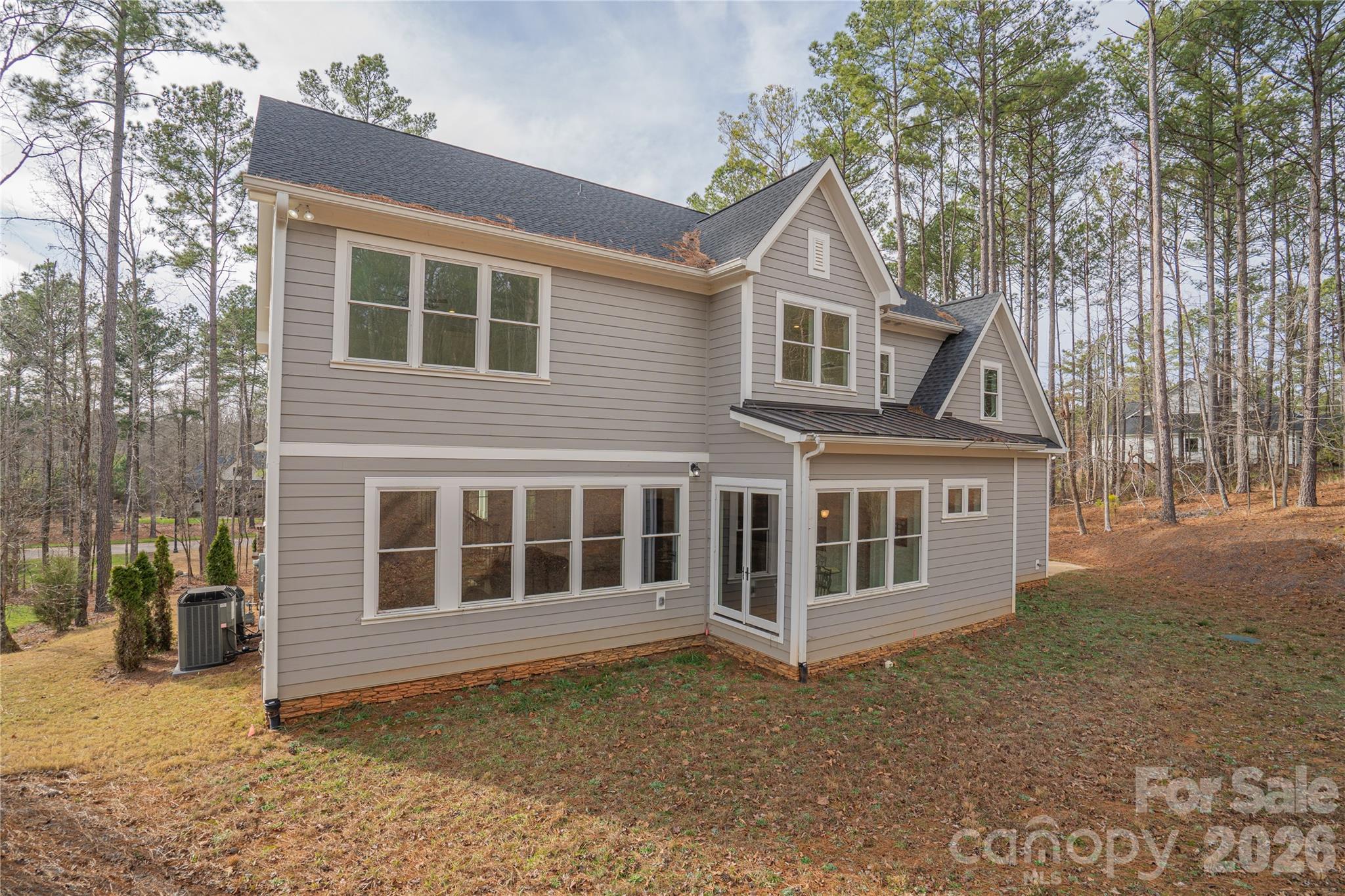 6178 Chimney Bluff Road Lancaster, SC 29720 - Photo 3 of 34 a view of a house with a window in the yard