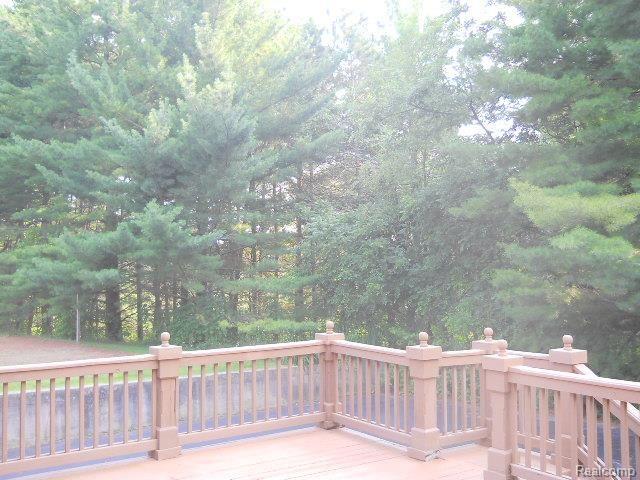 2828 Chilson Road Howell, MI 48843 - Photo 12 of 79 NW view into woods