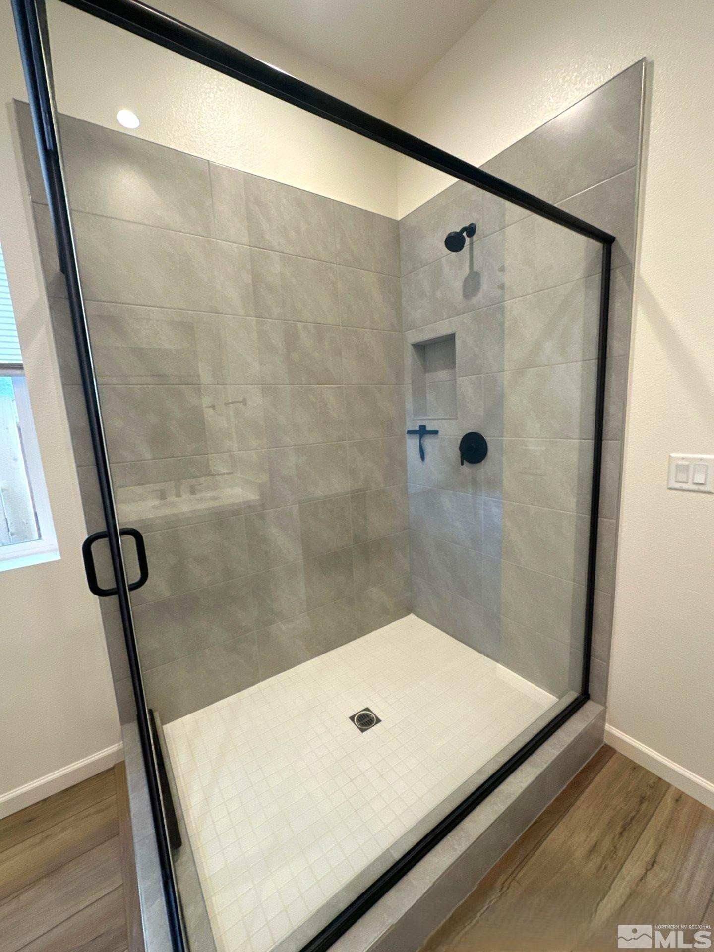 2494 Metolius Drive Sparks, NV 89436 - Photo 13 of 22 a bathroom with a shower