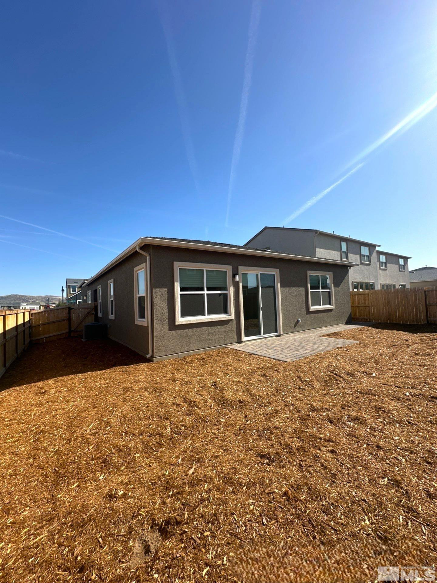 2494 Metolius Drive Sparks, NV 89436 - Photo 22 of 22 a front view of a house with a yard