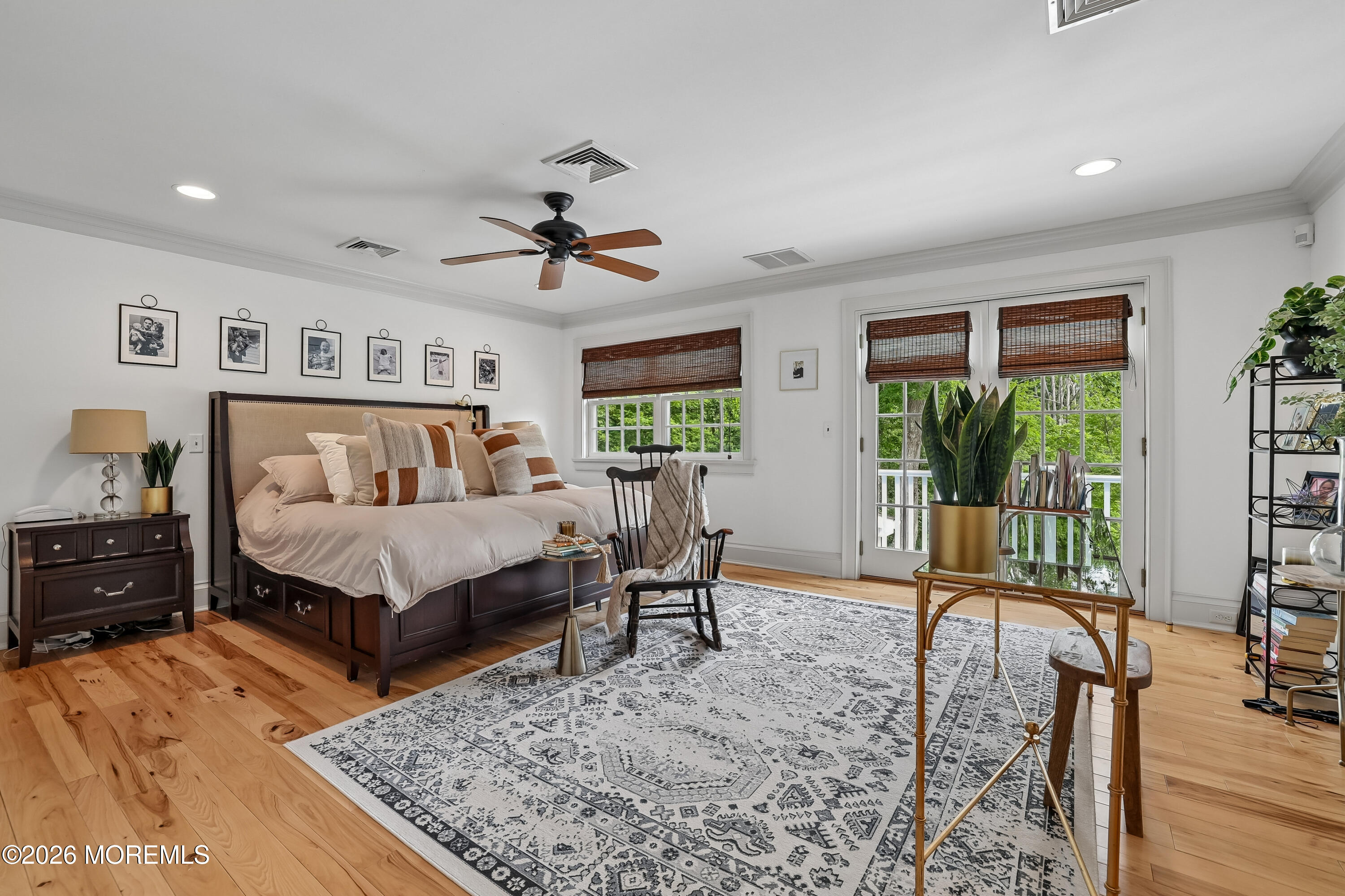 92 Tulip Lane Colts Neck, NJ 07722 - Photo 21 of 55 a bedroom with a bed a table and chair