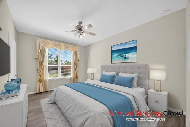 a bedroom with a large bed and a window