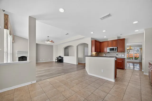 a view of a kitchen with furniture and a kitchen