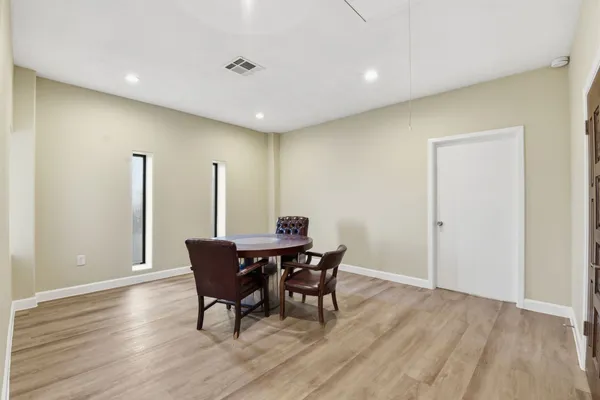 a view of a dining room with furniture