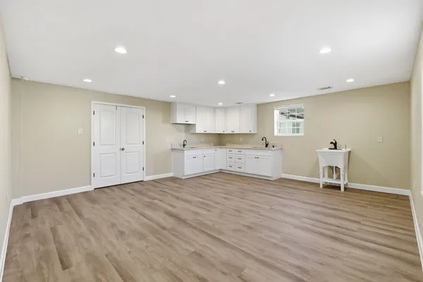 a bathroom with a sink and mirror