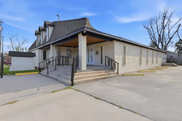 a view of a house with a street