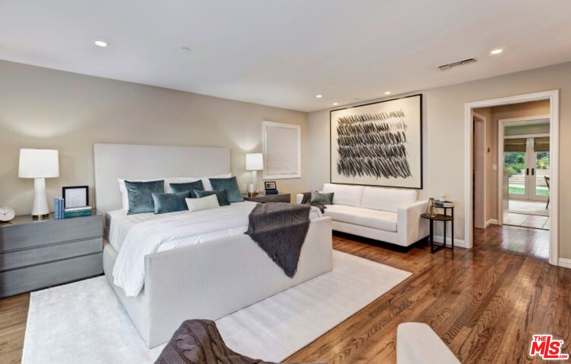 20779 Big Rock Drive Malibu, CA 90265 - Photo 17 of 37 a bedroom with a bed and a couch