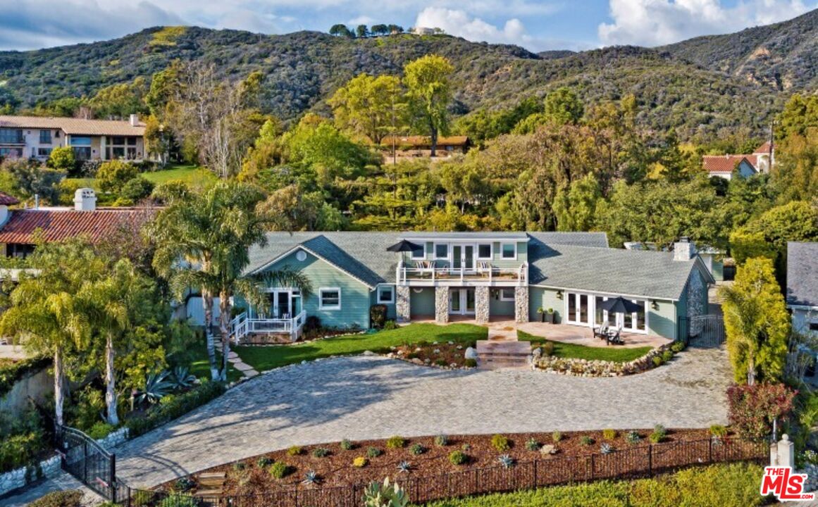 20779 Big Rock Drive Malibu, CA 90265 - Photo 2 of 37 an aerial view of residential houses with outdoor space and trees