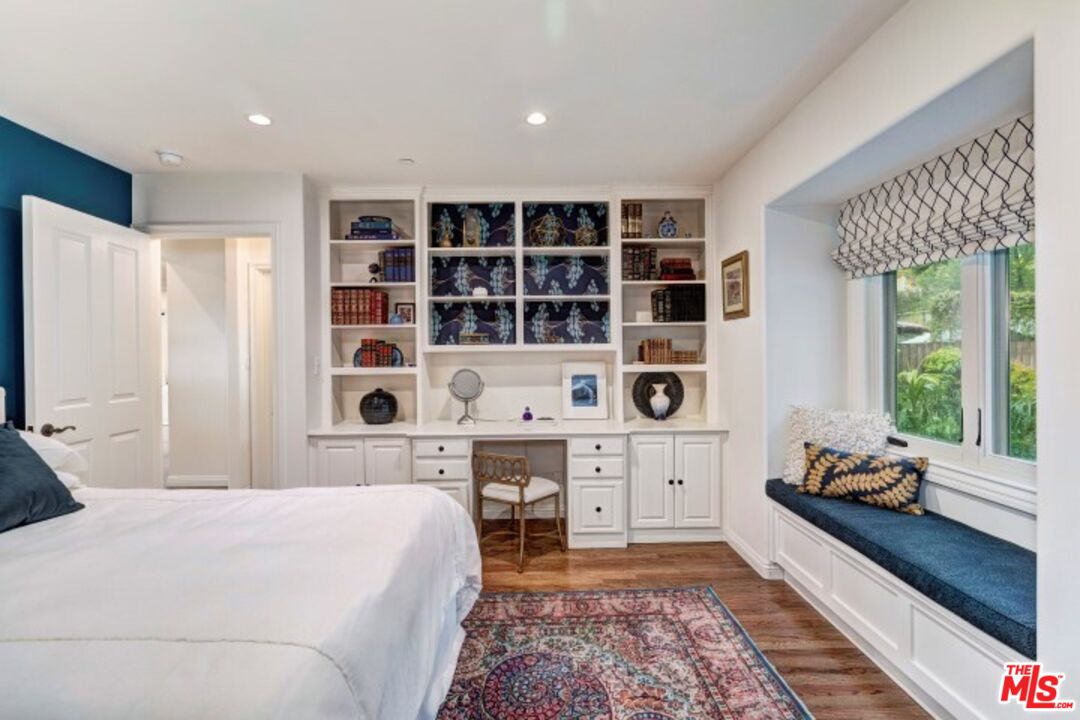 20779 Big Rock Drive Malibu, CA 90265 - Photo 21 of 37 a bed room with a bed and a window