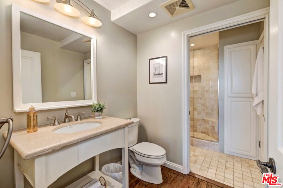 20779 Big Rock Drive Malibu, CA 90265 - Photo 25 of 37 a bathroom with a sink toilet and shower