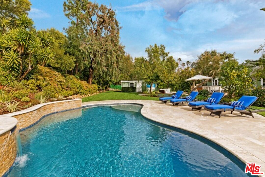 20779 Big Rock Drive Malibu, CA 90265 - Photo 31 of 37 a view of a swimming pool with a patio