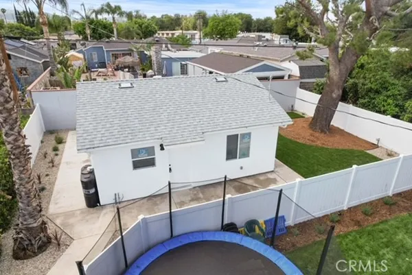 an aerial view of a house with swimming pool