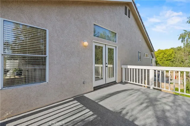 a view of a balcony with deck
