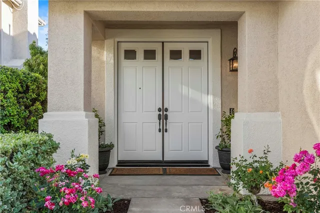 a view of a door and a window
