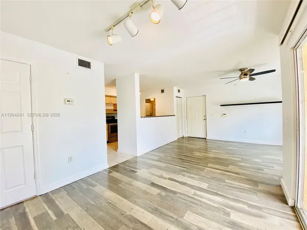 a view of a kitchen with a closet